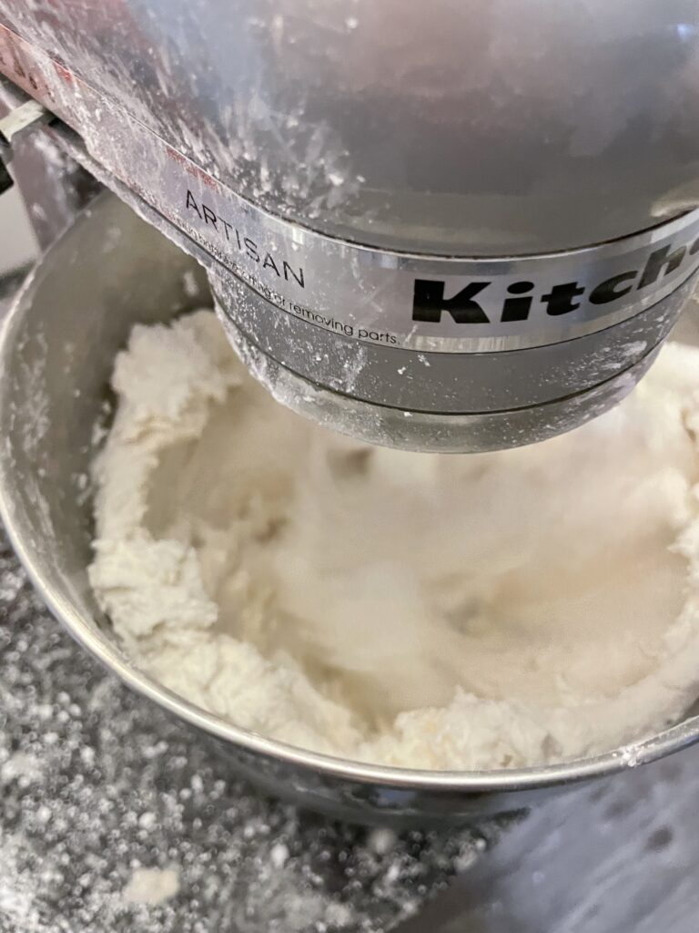 whipping shortening and 10x sugar in a standup mixer